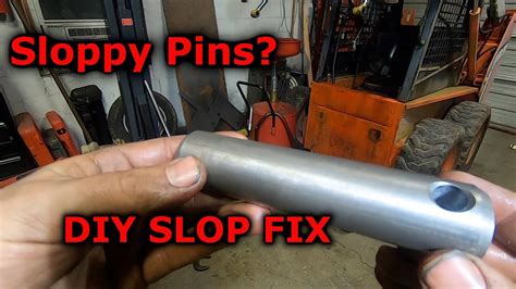 john deere skid steer bucket pin removal|youtube skid steer pin repair.